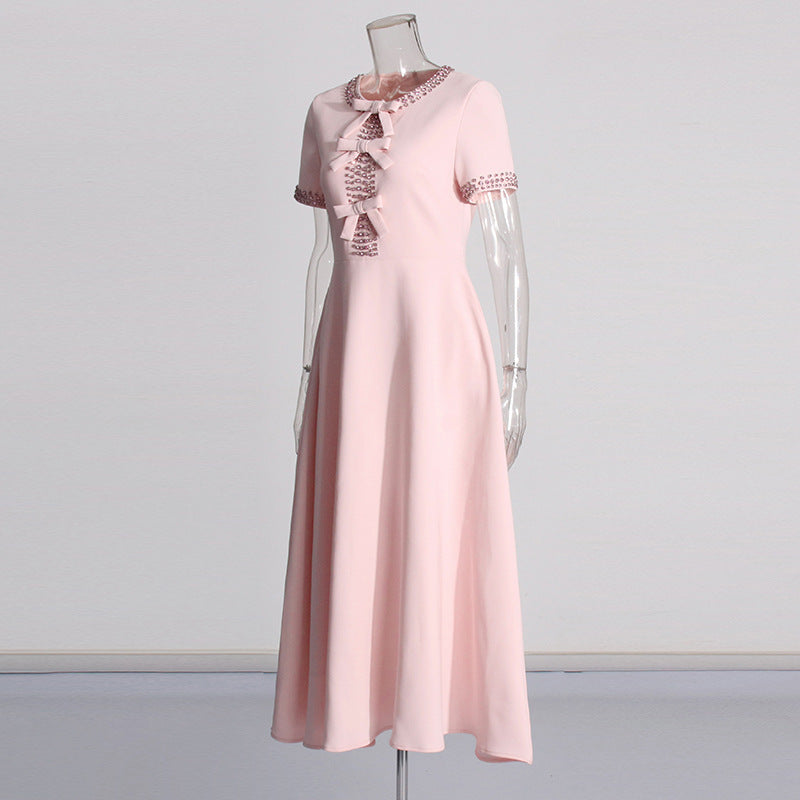 Mary – Hochwertiges Rundhalskleid mit Strass-Schleife und hohem Bund