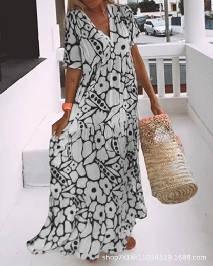 Zoe – Lockeres, Schlankmachendes Blumenkleid in Großen Größen