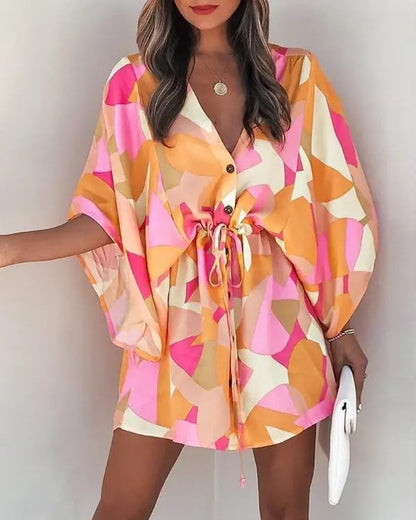 Kelly – V-Ausschnitt gebundenes Strandkleid mit Druck