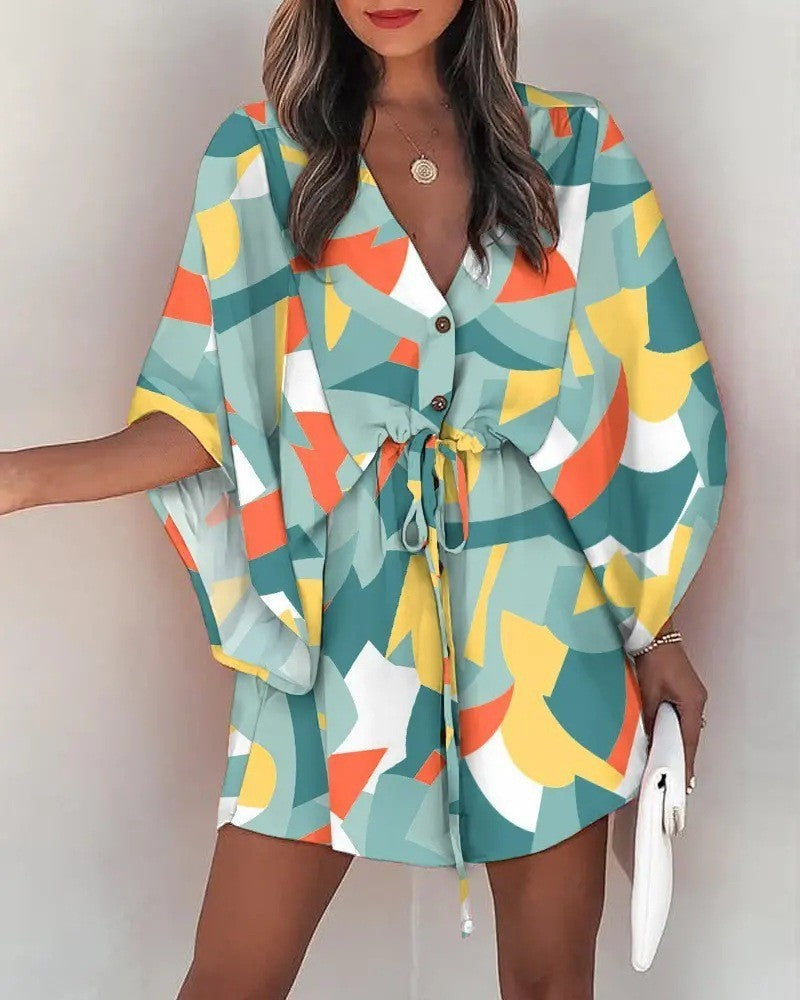 Kelly – V-Ausschnitt gebundenes Strandkleid mit Druck