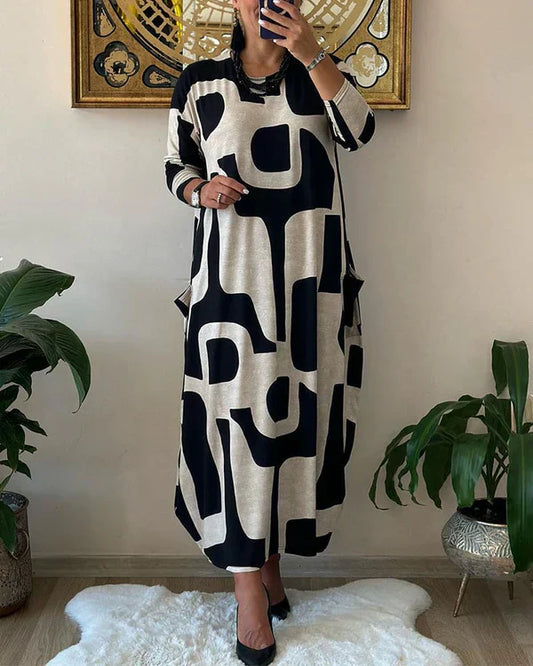Pamela – Fließendes Maxikleid mit Kunstdruck und ärmellosem Design