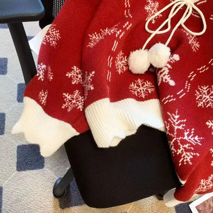 Damen Strickjacke Winter Stil mit Schneeflocken und Bommel – Modische Freizeitjacke für die kalte Jahreszeit