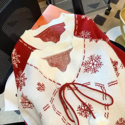 Damen Strickjacke Winter Stil mit Schneeflocken und Bommel – Modische Freizeitjacke für die kalte Jahreszeit