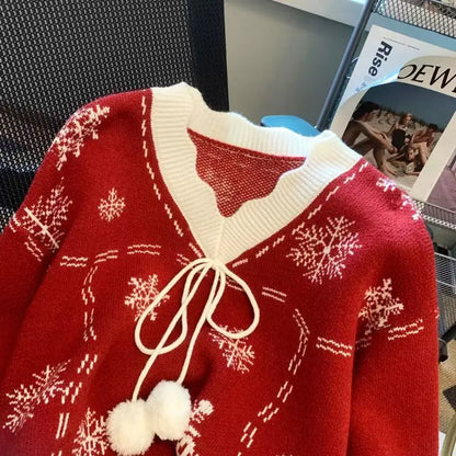 Damen Strickjacke Winter Stil mit Schneeflocken und Bommel – Modische Freizeitjacke für die kalte Jahreszeit